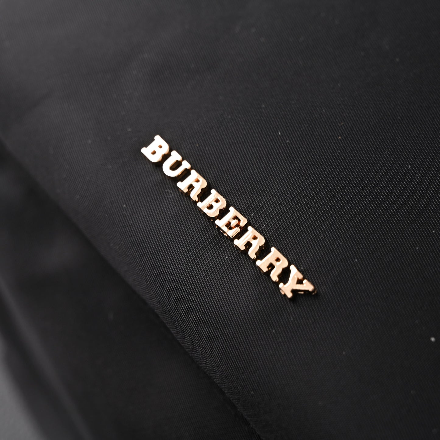 Burberry The Rucksack – Black Nylon & Leather Backpack with Gold-Tone Hardware