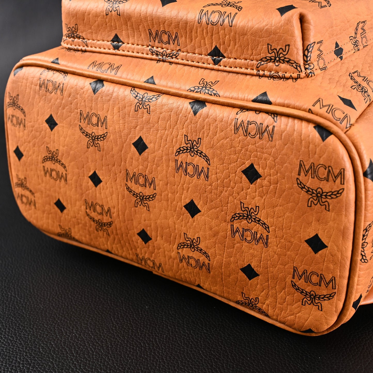 MCM Stark Visetos Medium Backpack – Cognac Monogram with Gold-Tone Studs