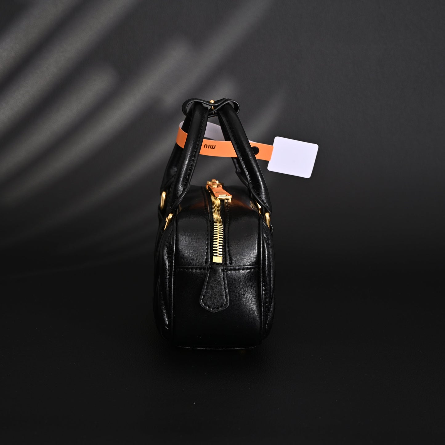 Miu Miu Black Matelassé Leather Top Handle Bag