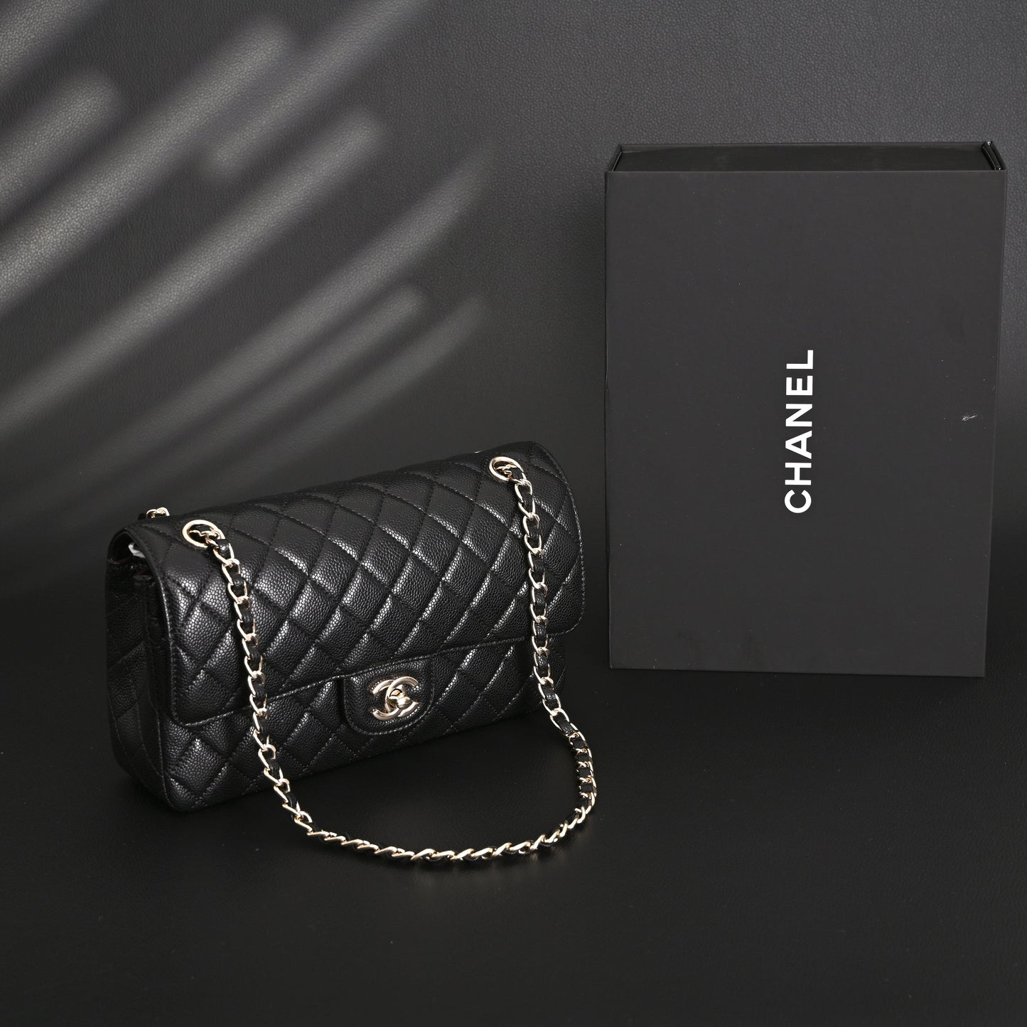 Chanel Classic Flap Bag – Black Quilted Caviar Leather with Gold-Tone Hardware