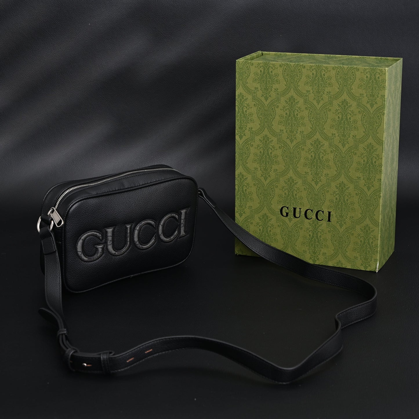 Gucci Black Leather Embossed Logo Belt Bag