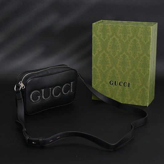 Gucci Black Leather Embossed Logo Belt Bag