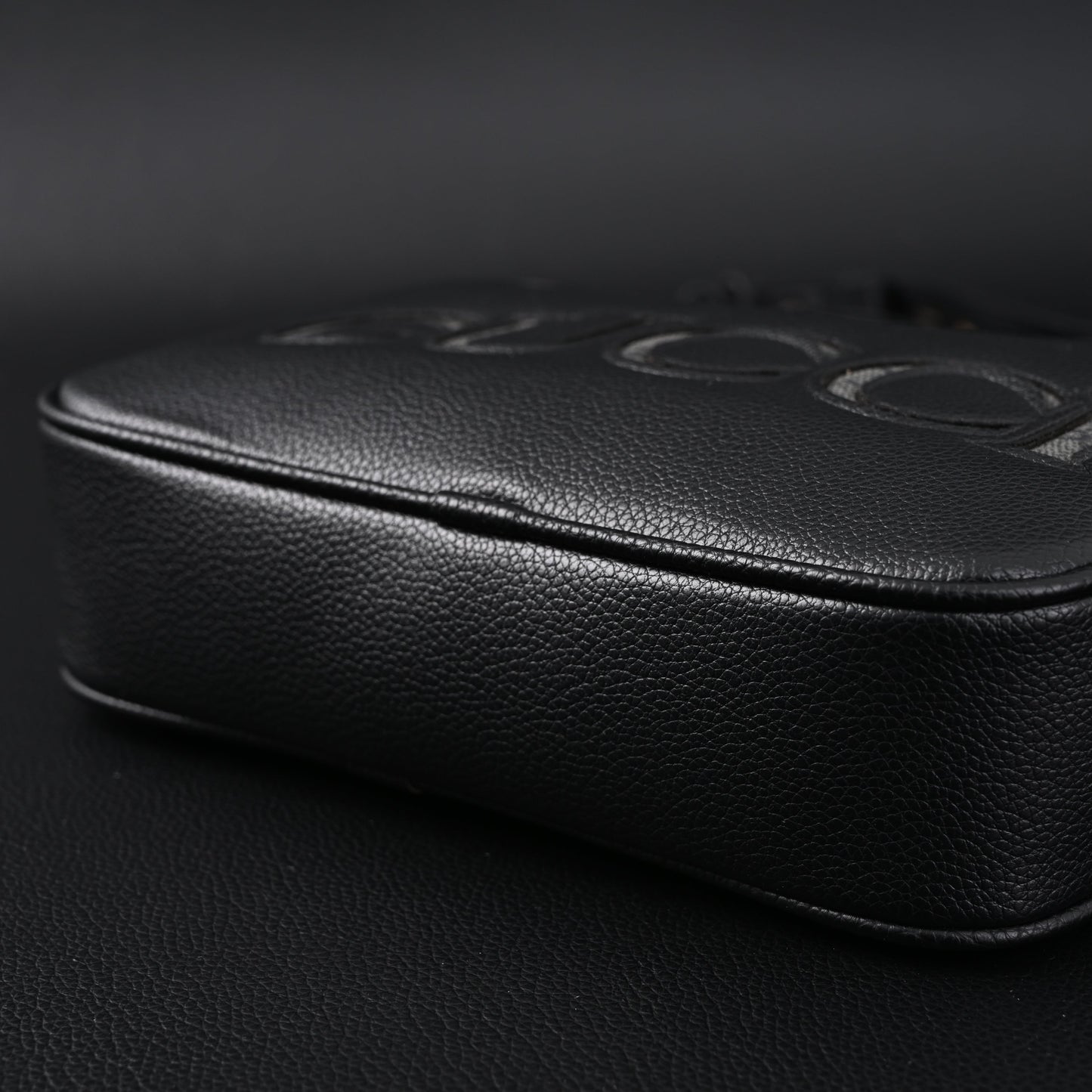 Gucci Black Leather Embossed Logo Belt Bag